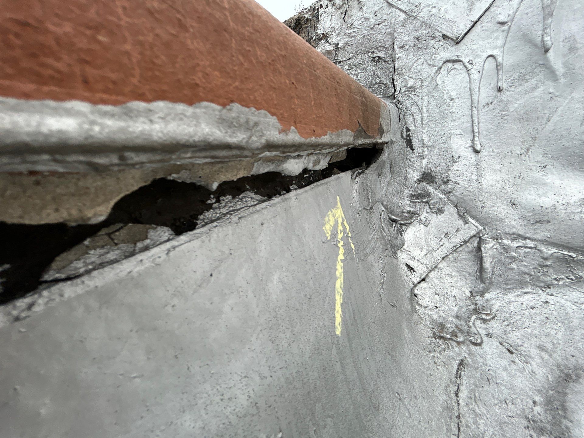Could My Parapet Wall Be the Reason My Flat Roof Is Leaking?